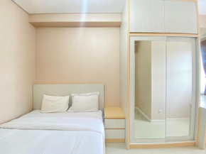 Cozy and Minimalist 2BR Apartment at Parahyangan Residence By Travelio